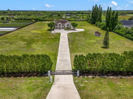 a view of a lake with a big yard