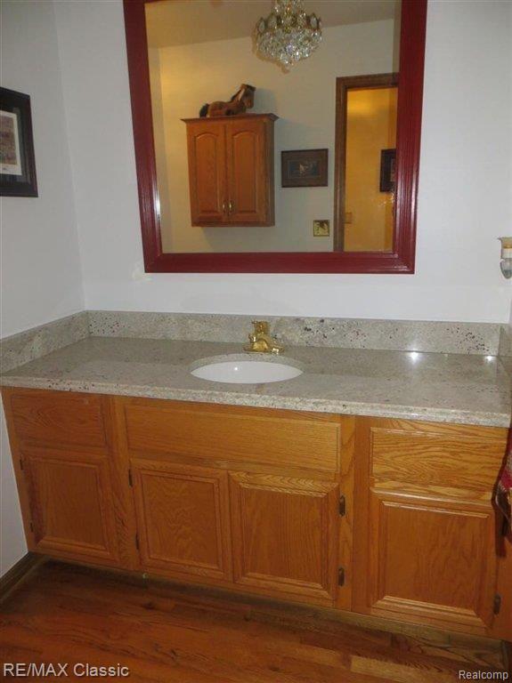 3101 Quail Ridge Circle Rochester, MI 48309 - Photo 9 of 19 Granite Powderoom.jpg