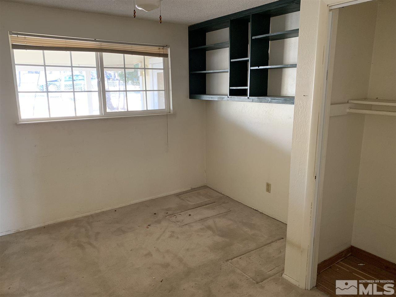 8579 Aquifer Way Reno, NV 89506 - Photo 11 of 17 an empty room with closet