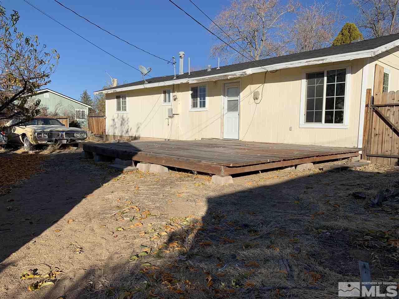8579 Aquifer Way Reno, NV 89506 - Photo 12 of 17 a view of a back yard of the house