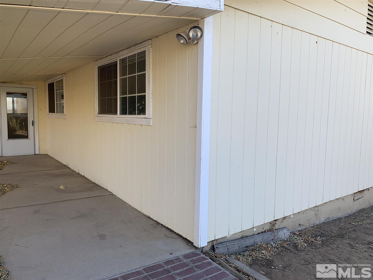 8579 Aquifer Way Reno, NV 89506 - Photo 4 of 17 a view of front door