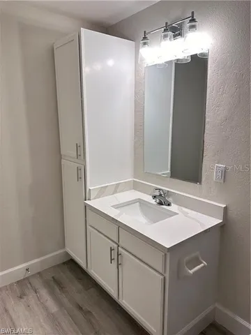 a bathroom with a toilet a sink and bathtub