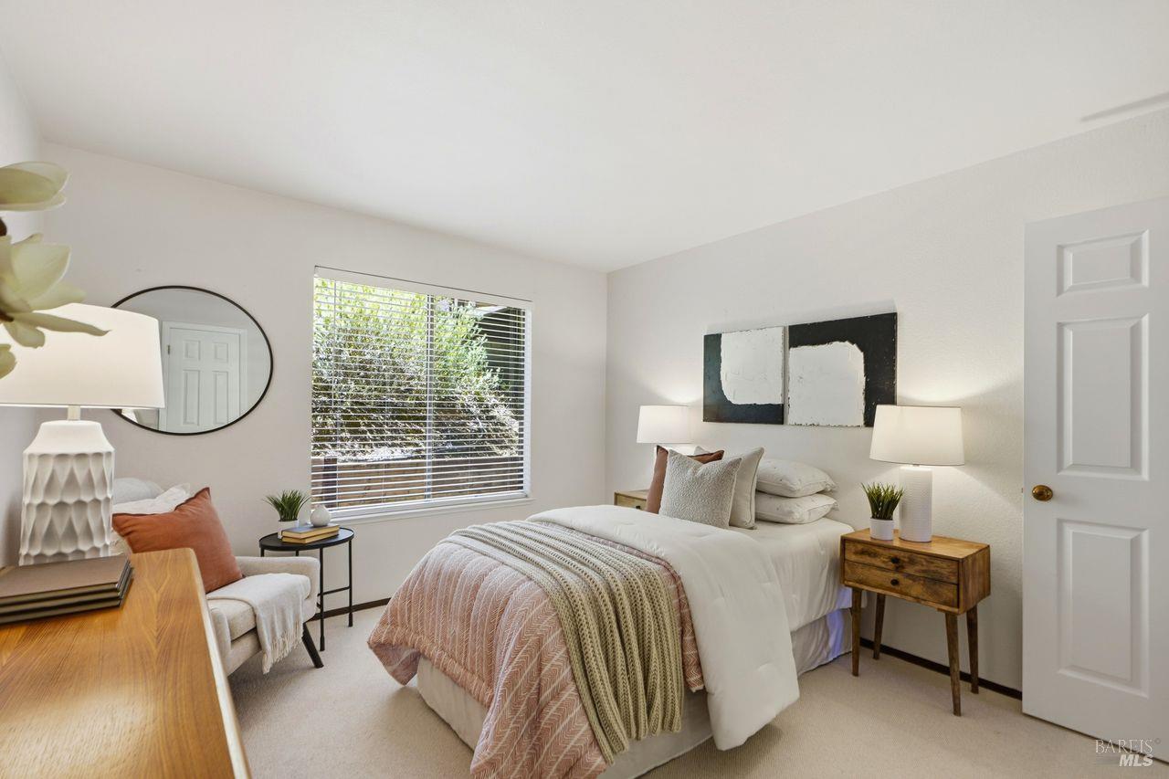 808 Arlene Way Novato, CA 94947 - Photo 27 of 45 Sunlit second bedroom filled with natural light and a warm, welcoming ambiance.