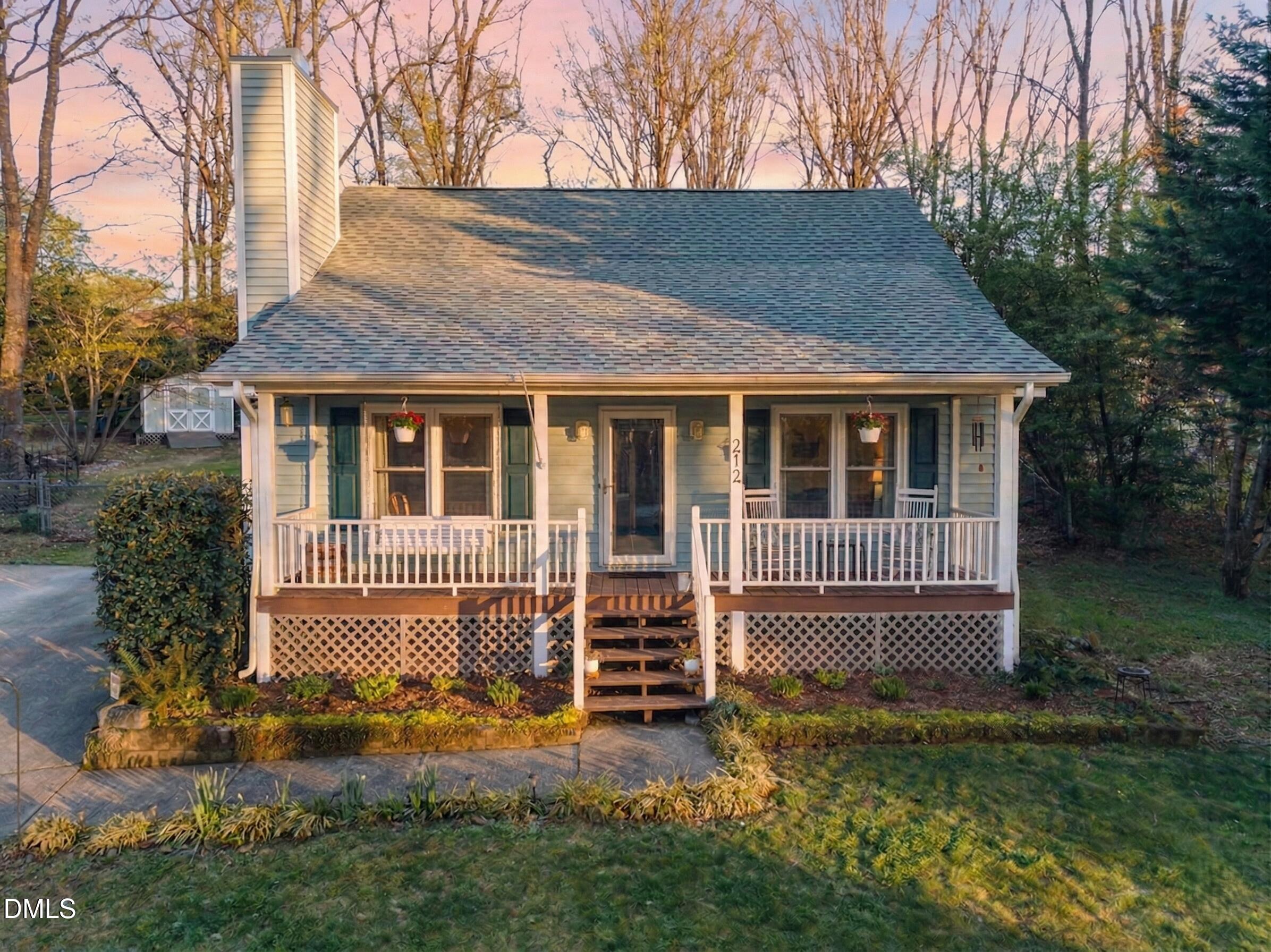 212 Esquire Lane Cary, NC 27513 - Photo 1 of 31 a front view of a house with a yard