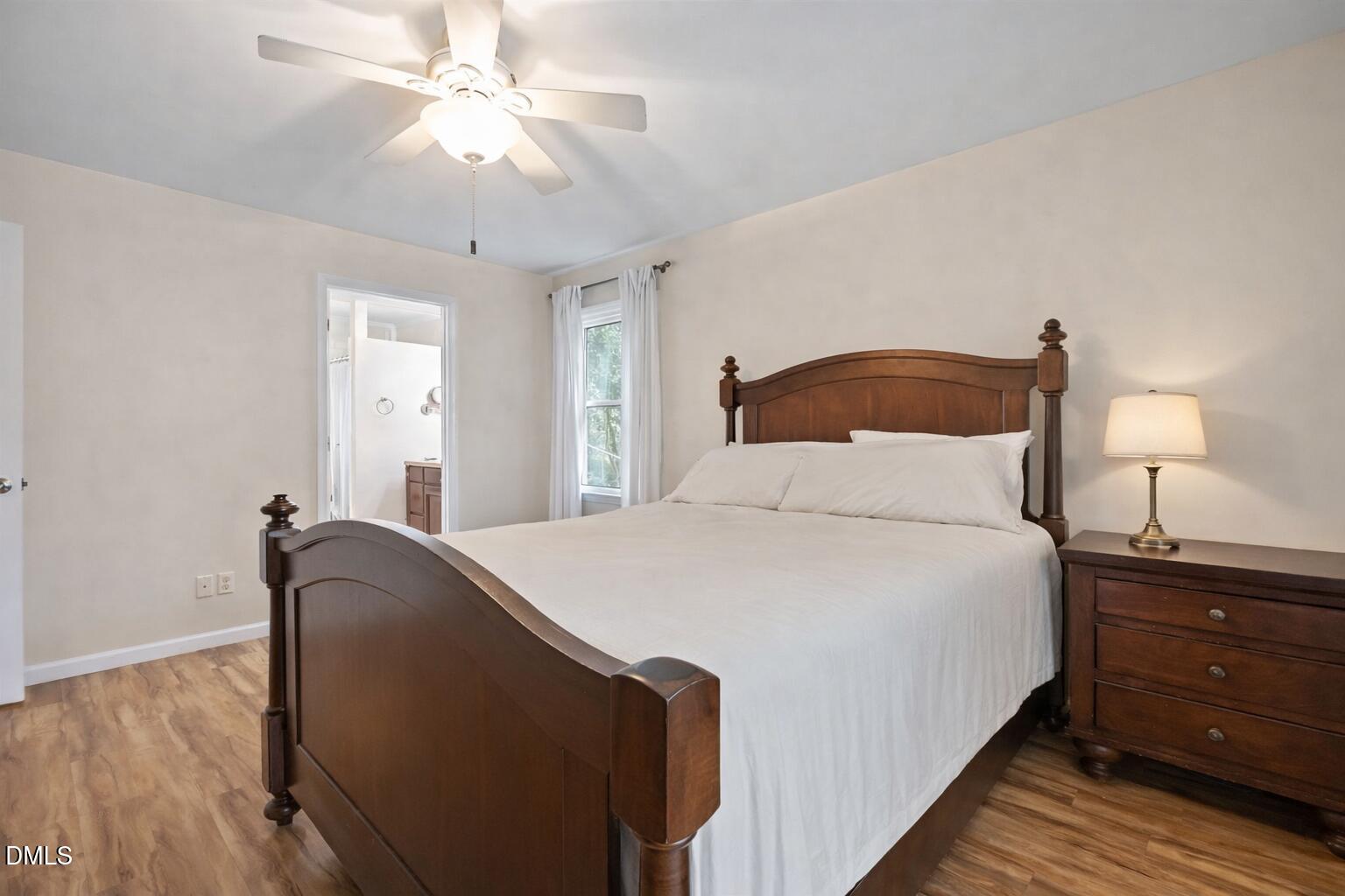 212 Esquire Lane Cary, NC 27513 - Photo 11 of 31 a bedroom with bed and window