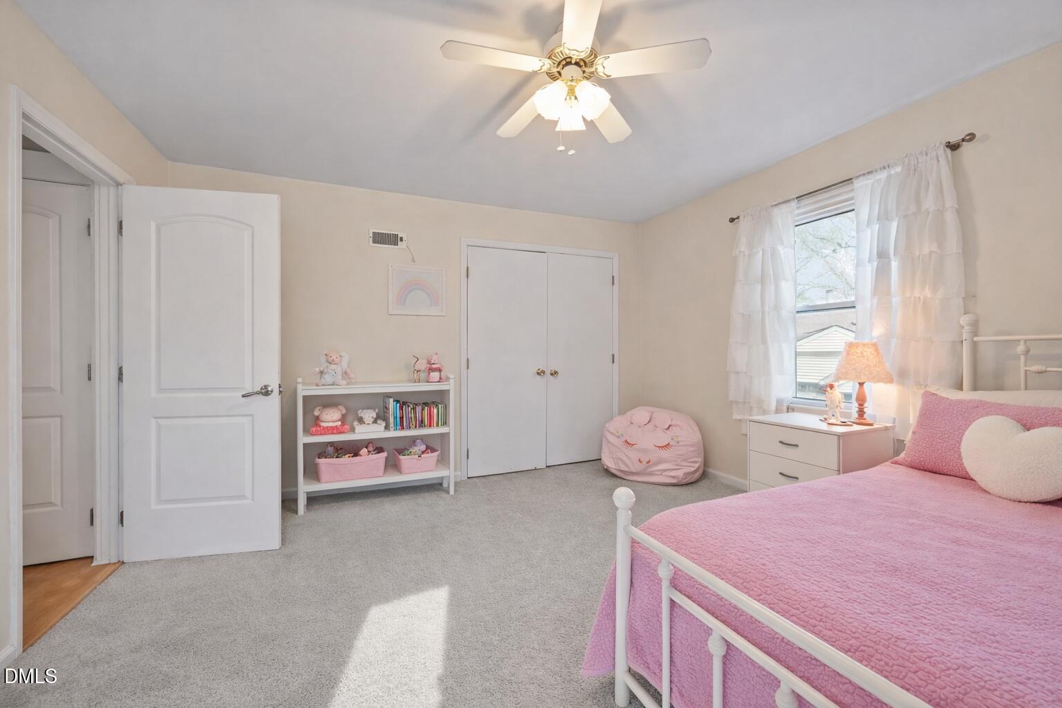 212 Esquire Lane Cary, NC 27513 - Photo 15 of 31 a bedroom with furniture and a window