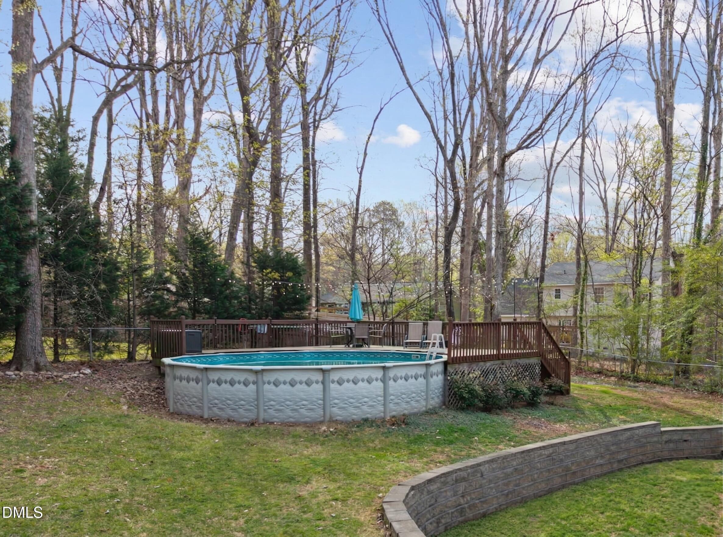 212 Esquire Lane Cary, NC 27513 - Photo 21 of 31 a view of a lake with sitting area