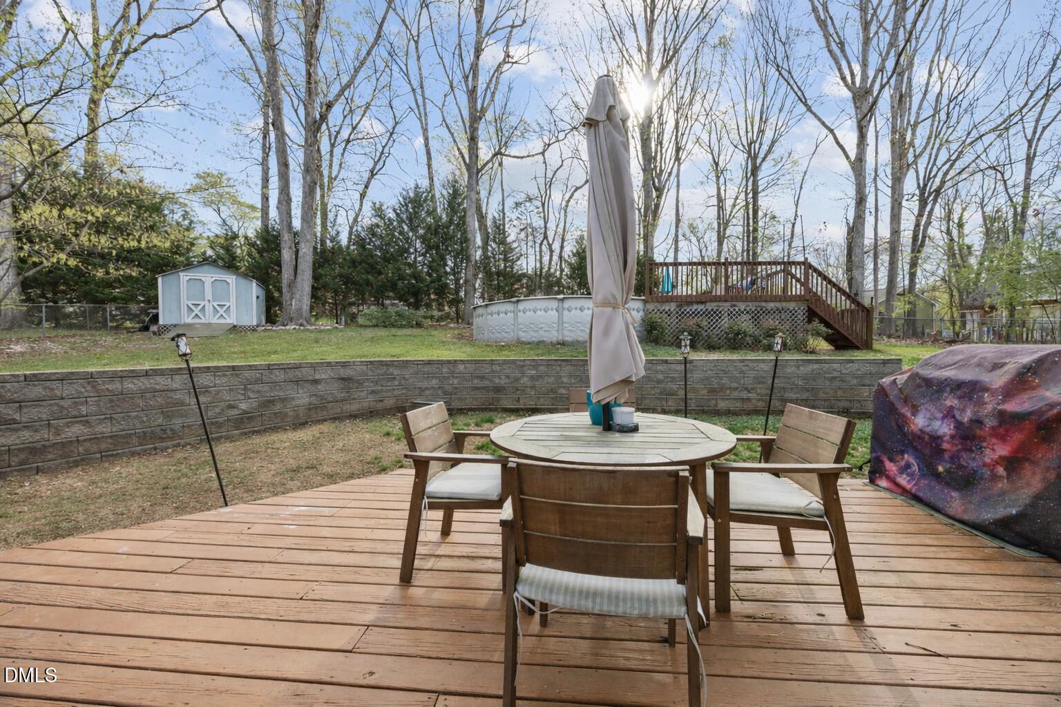 212 Esquire Lane Cary, NC 27513 - Photo 24 of 31 a view of a deck with furniture