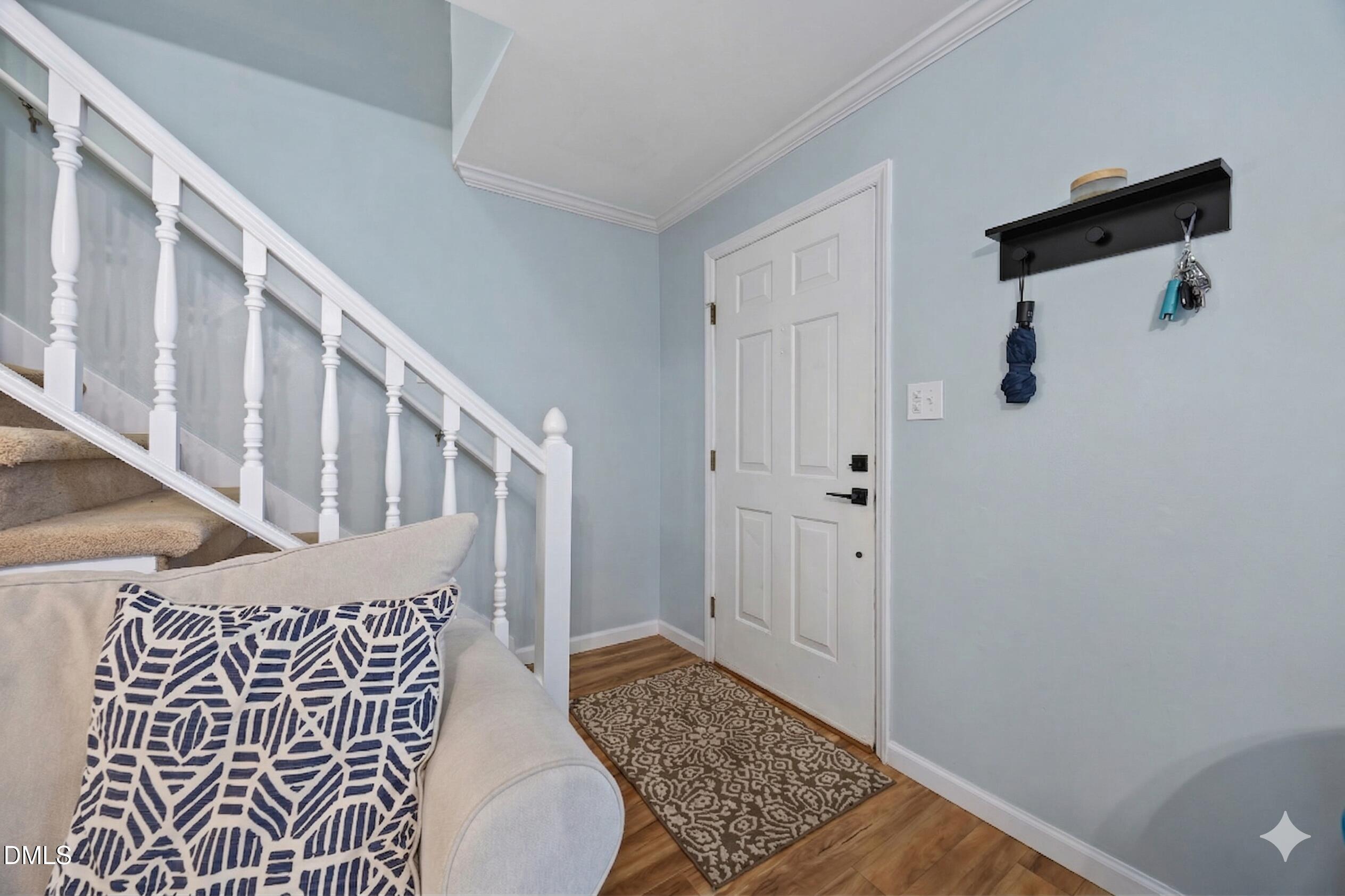 212 Esquire Lane Cary, NC 27513 - Photo 9 of 31 a view of entryway with wooden floor