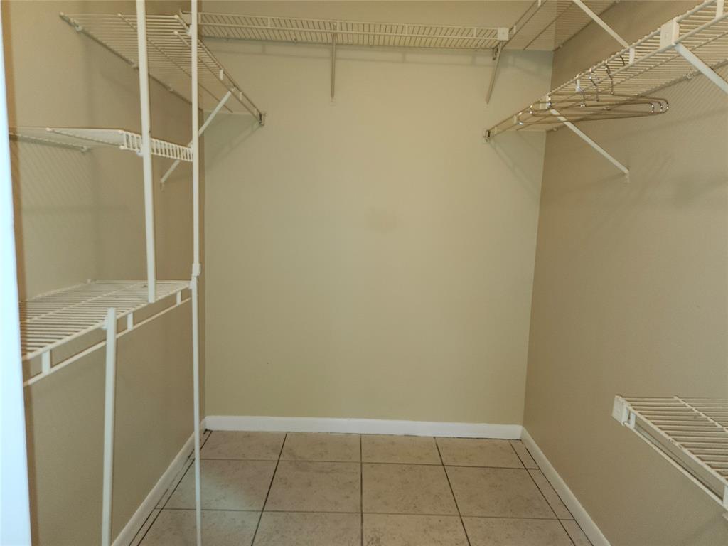 545 Trace Circle, Unit 105 Deerfield Beach, FL 33441 - Photo 31 of 44 a view of an empty room