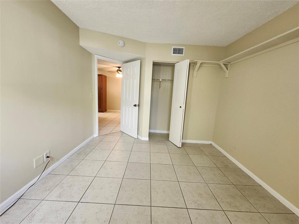 545 Trace Circle, Unit 105 Deerfield Beach, FL 33441 - Photo 33 of 44 a view of an empty room