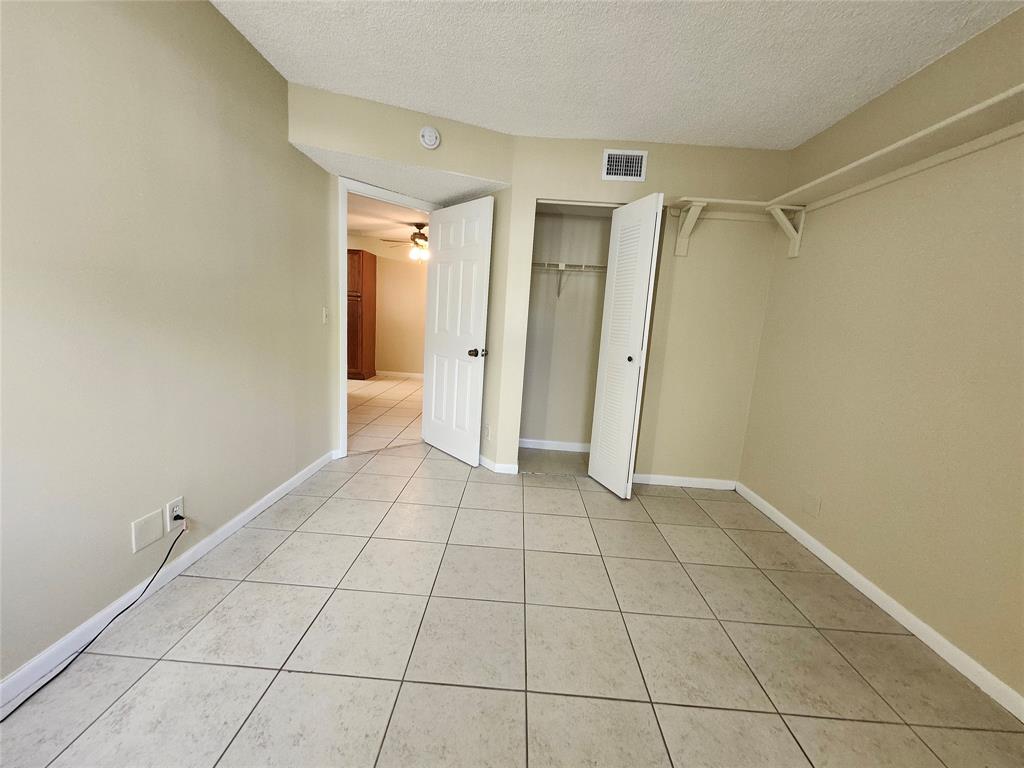 545 Trace Circle, Unit 105 Deerfield Beach, FL 33441 - Photo 34 of 44 a view of an empty room