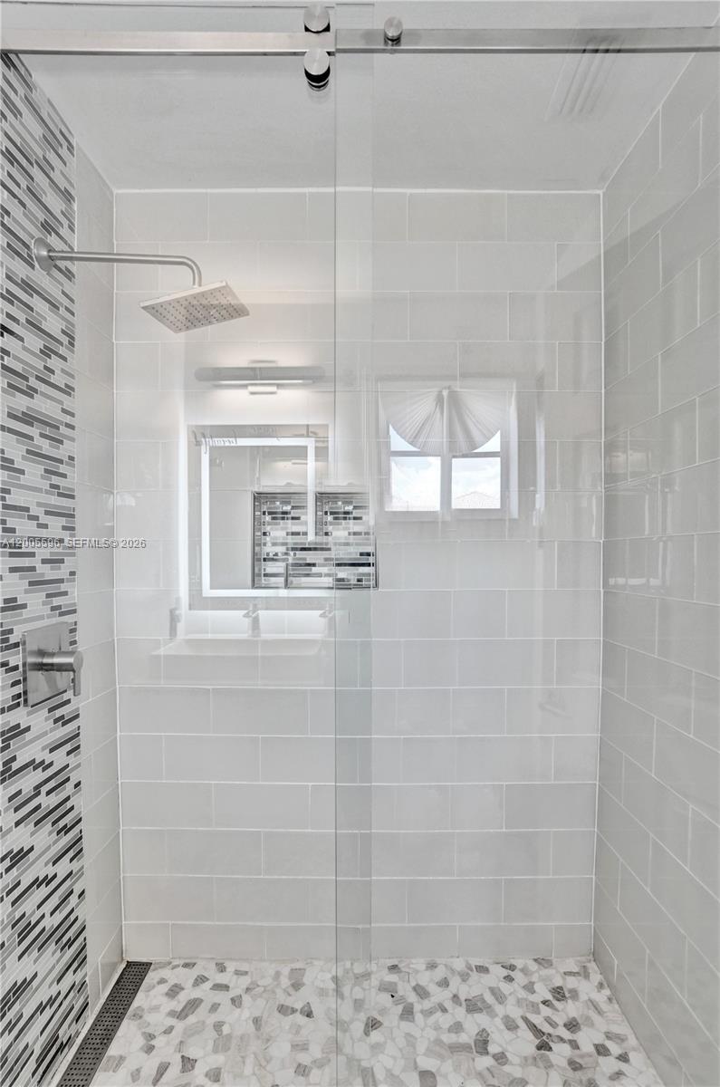 4281 Laurel Ridge Circle Weston, FL 33331 - Photo 55 of 80 a bathroom with a shower