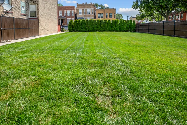 a view of a backyard with a garden