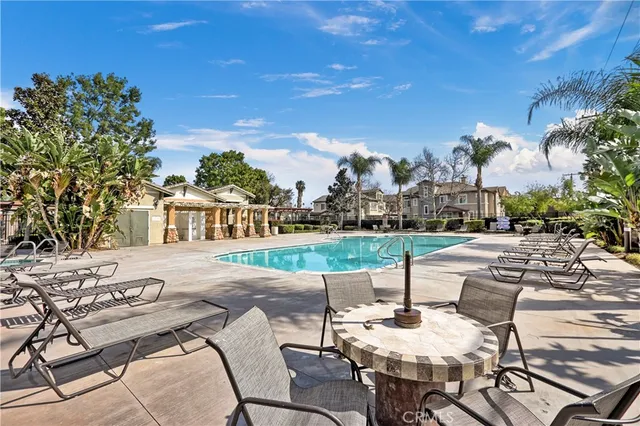 a view of yard with patio and outdoor seating