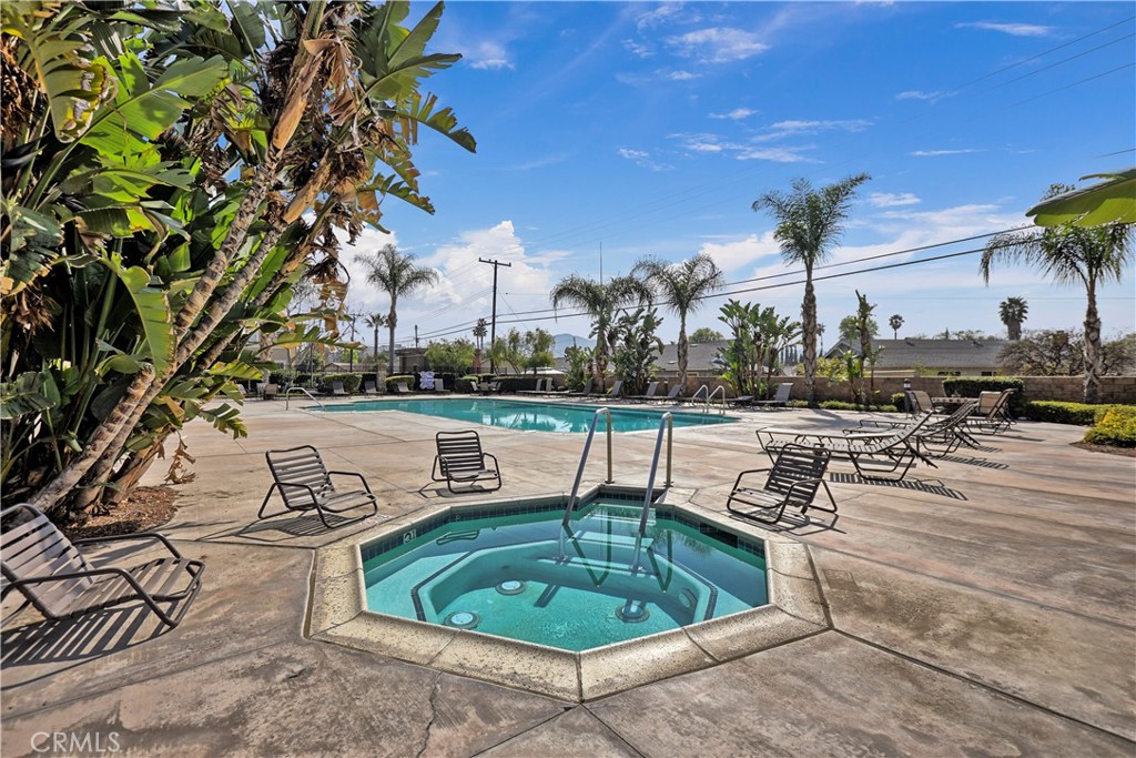 3894 Polk Street, Unit E Riverside, CA 92505 - Photo 22 of 28 a view of a swimming pool with a patio