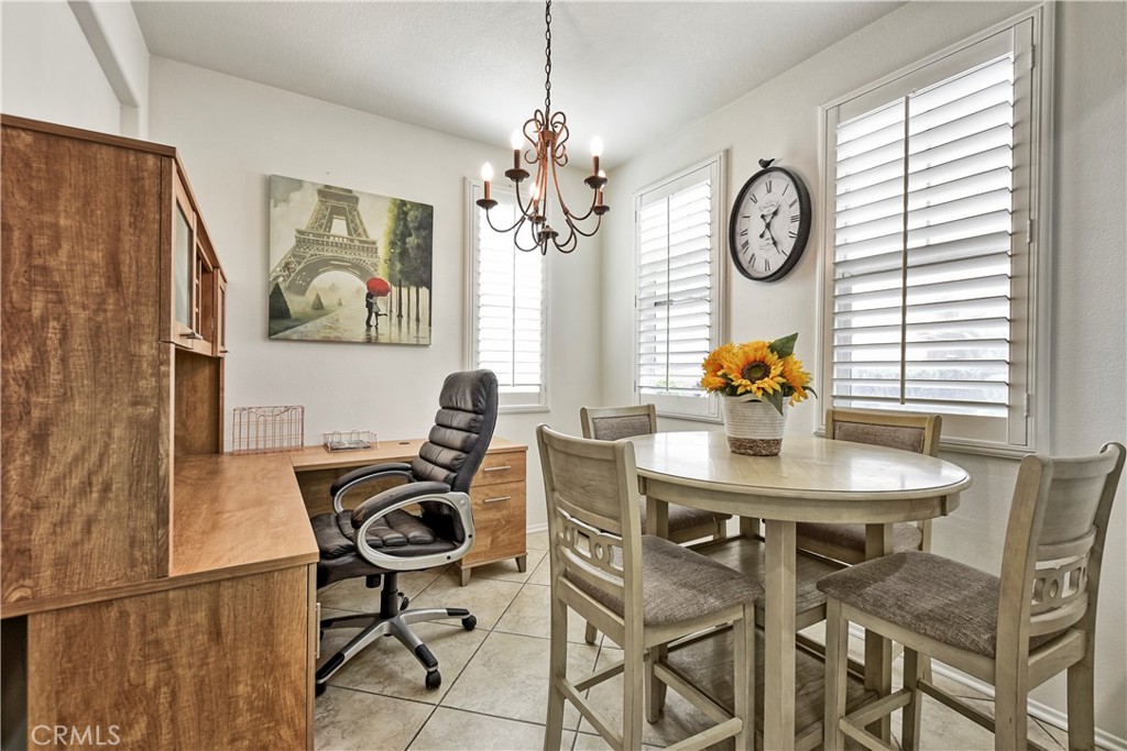 3894 Polk Street, Unit E Riverside, CA 92505 - Photo 6 of 28 a view of a dining room and a table chairs