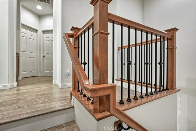a view of a balcony with staircase