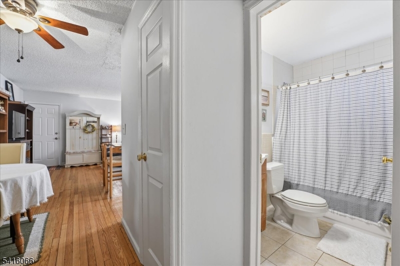 753 Broad Avenue, Unit A Ridgefield, NJ 07657 - Photo 17 of 23 a bathroom with a toilet and a shower
