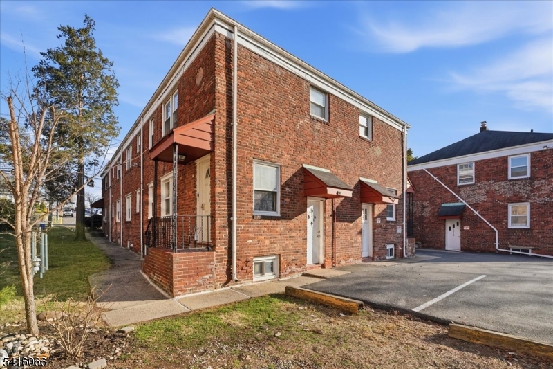 753 Broad Avenue, Unit A Ridgefield, NJ 07657 - Photo 3 of 23 a view of a house with a yard