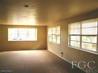 11561 Shawnee Road Fort Myers, FL 33913 - Photo 2 of 10 a view of an empty room with a window