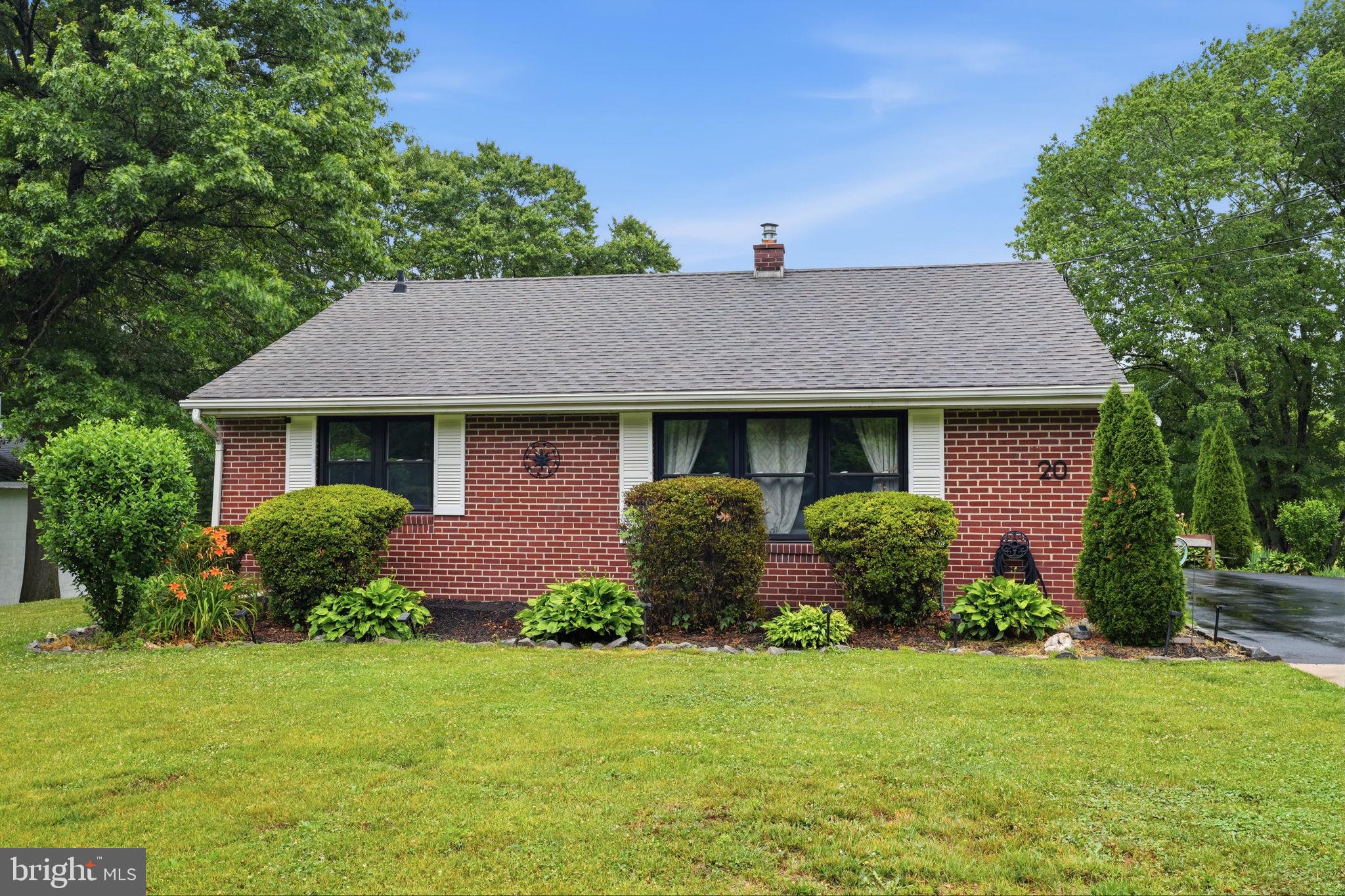 20 Poplar Road Ringoes, NJ 08551 - Photo 4 of 44 Charming brick home with lush greenery.
