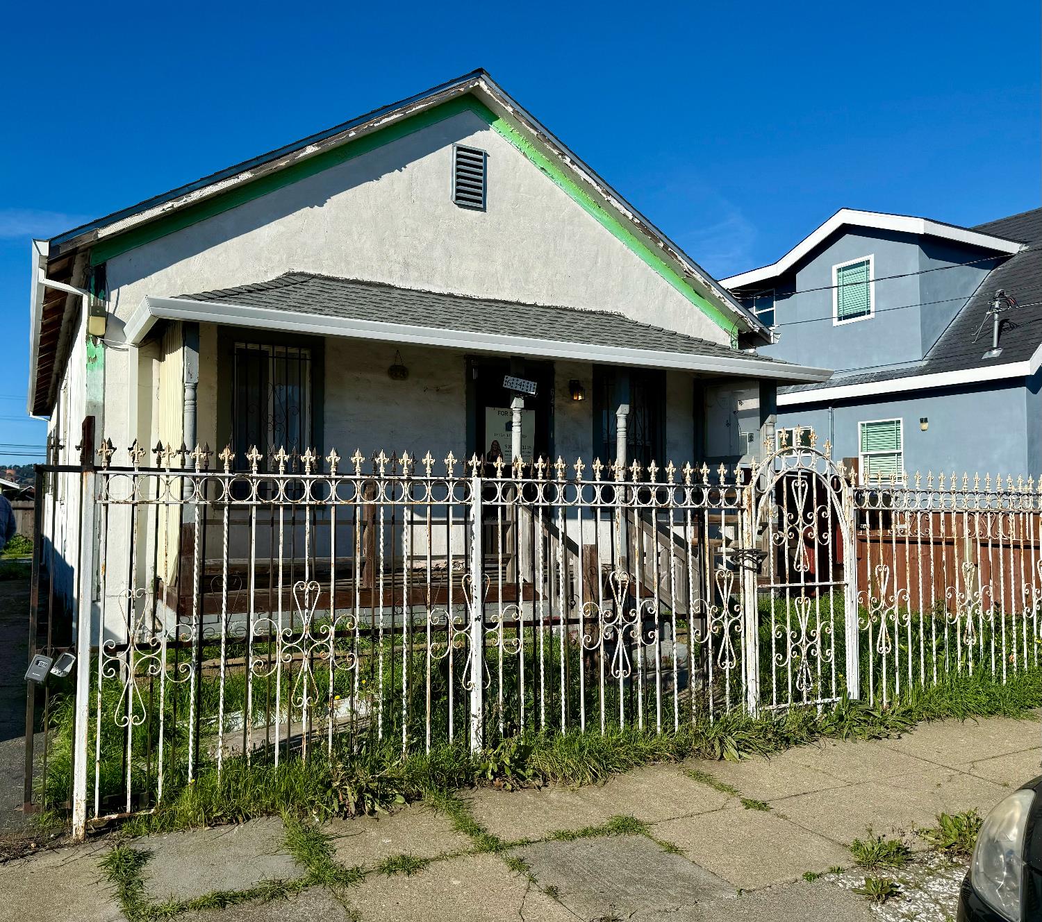 641 9th Street Richmond, CA 94801 - Photo 1 of 14 a front view of a house with a garden