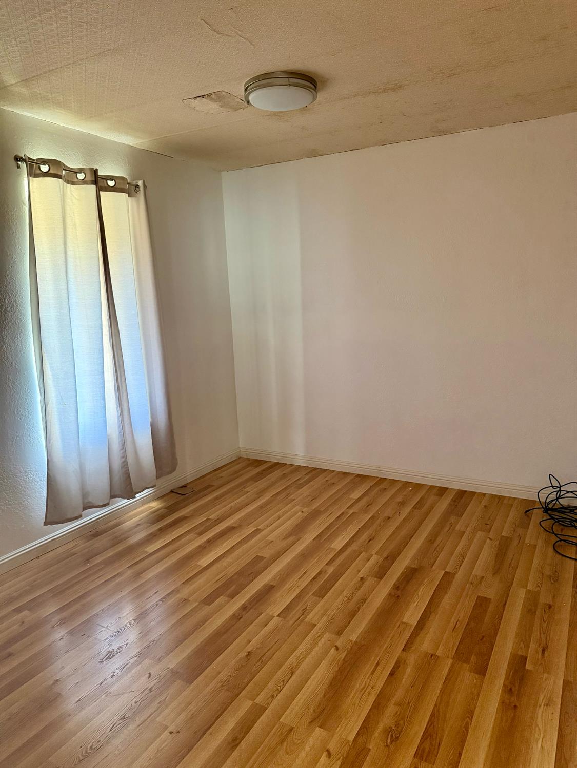 641 9th Street Richmond, CA 94801 - Photo 14 of 14 a view of a room with wooden floor and bathroom