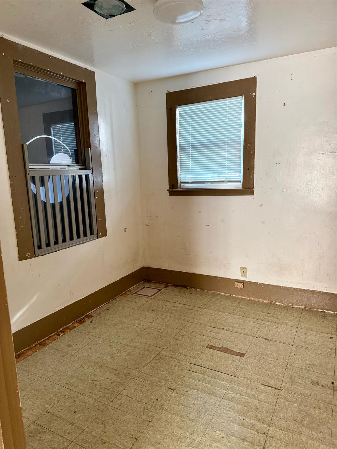 641 9th Street Richmond, CA 94801 - Photo 9 of 14 a view of an empty room with a window