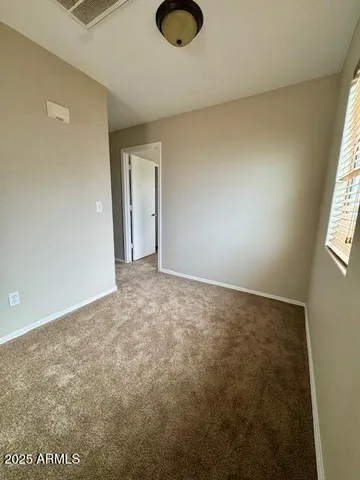 a view of a backyard of a house