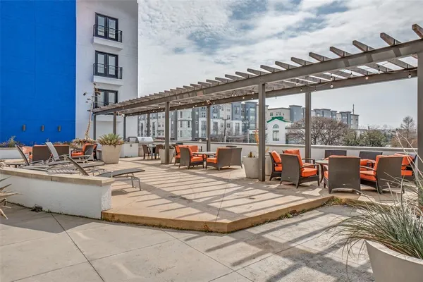 a view of a patio with couches chairs and a table and chairs