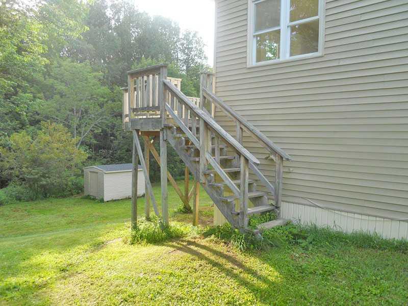 512 S Road Dixmont, ME 04932 - Photo 25 of 35 Patio/Deck. Stairs to deck and back door