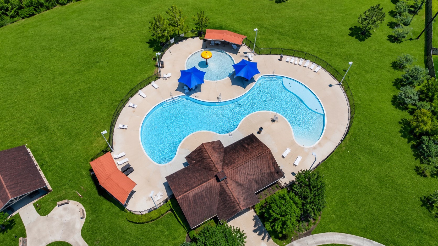 5522 Glenfield Spring Lane Spring, TX 77389 - Photo 43 of 46 This aerial view showcases a beautiful, expansive community pool located down the street from your soon to be new home!