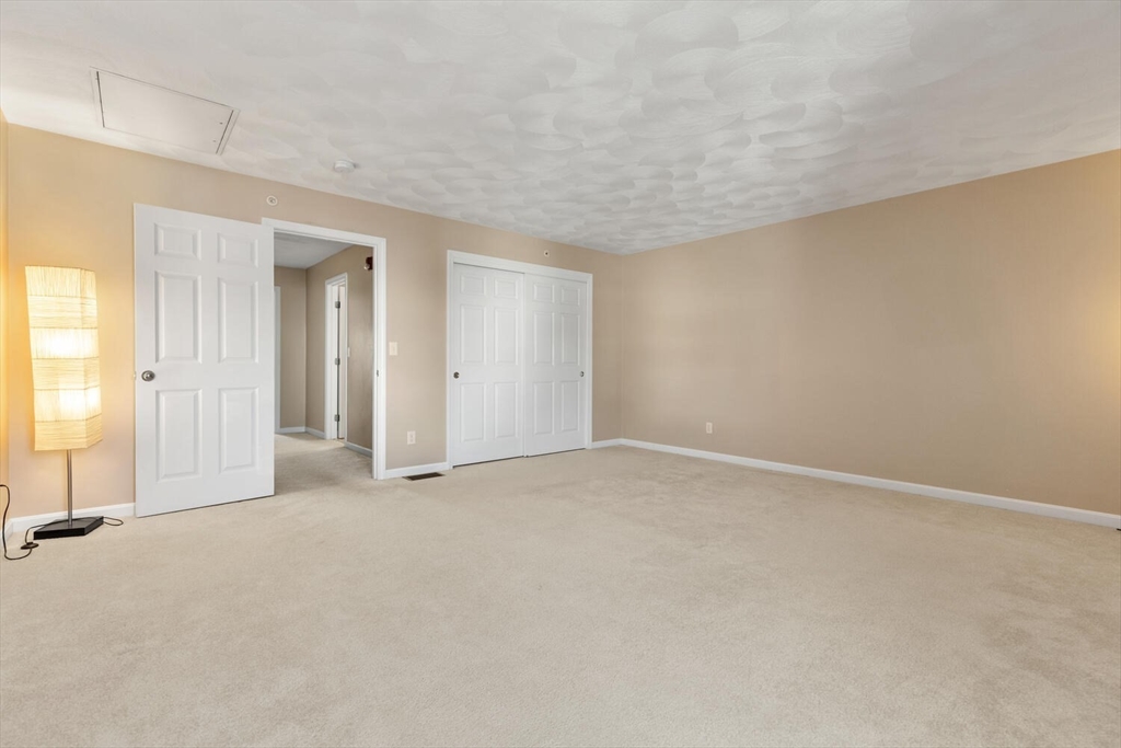 18 Dale Street, Unit 9D Andover, MA 01810 - Photo 20 of 33 an empty room with window