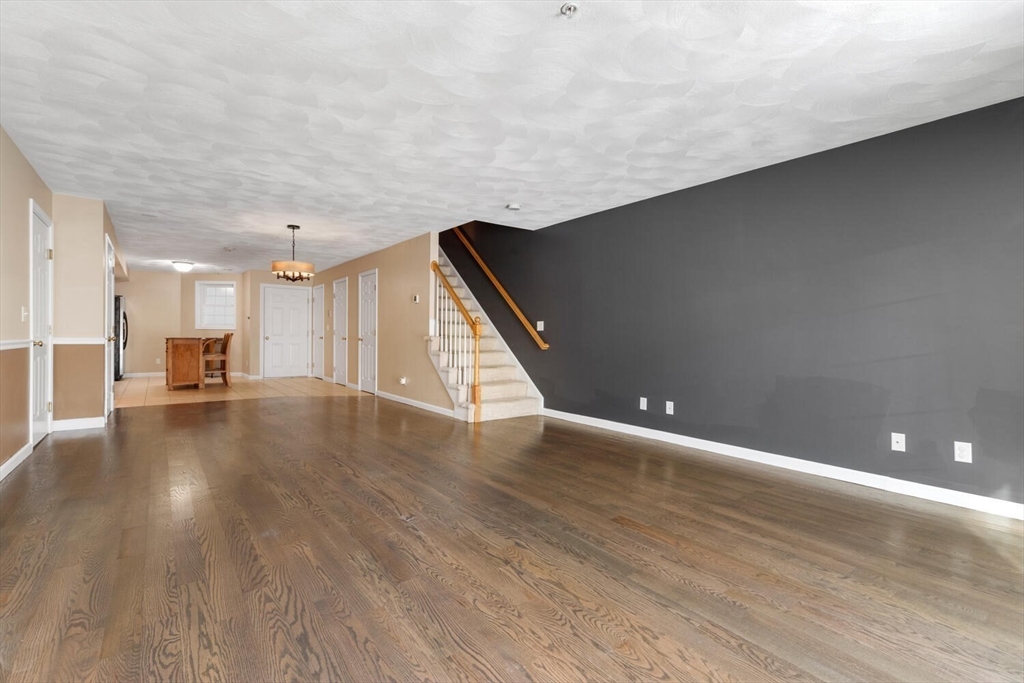 18 Dale Street, Unit 9D Andover, MA 01810 - Photo 2 of 33 a view of a livingroom with wooden floor