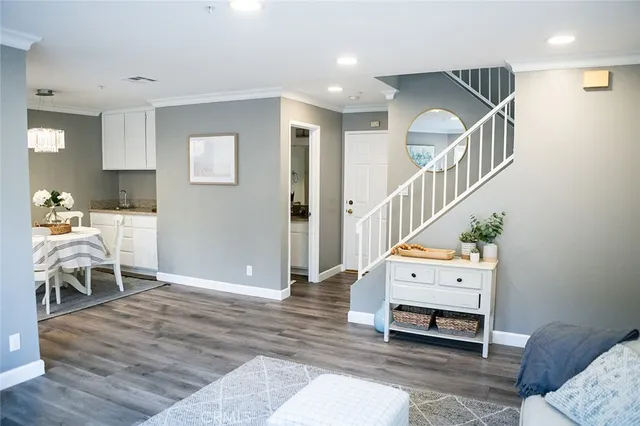 a living room with furniture and a table