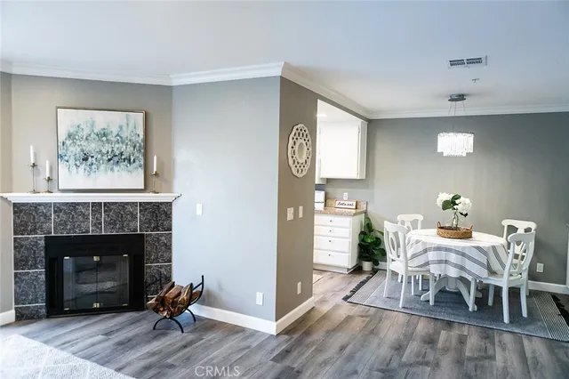 a view of a livingroom with furniture and a fireplace