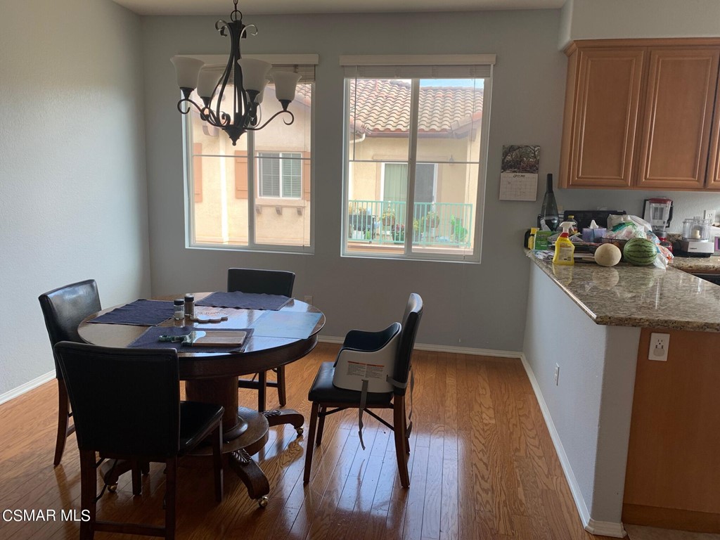 108 Via Katrina Newbury Park, CA 91320 - Photo 5 of 13 a view of a dining room with furniture window and wooden floor