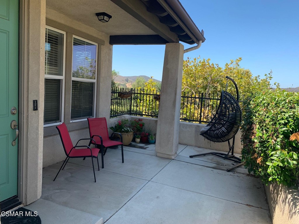 108 Via Katrina Newbury Park, CA 91320 - Photo 6 of 13 a view of a patio with table and chairs and potted plants