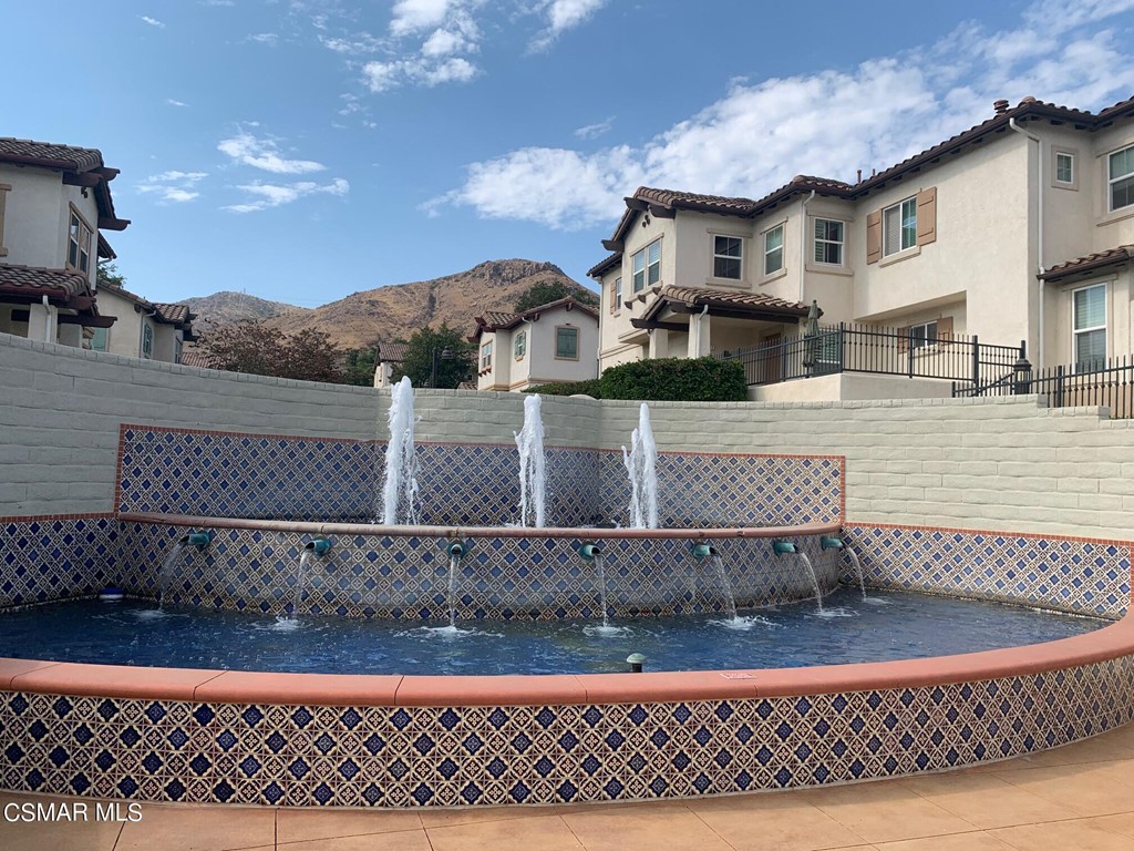 108 Via Katrina Newbury Park, CA 91320 - Photo 8 of 13 a view of a house with a yard