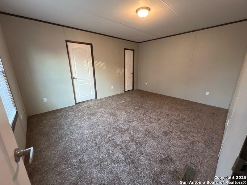 1029 Bowen Street Pleasanton, TX 78064 - Photo 4 of 4 a view of an empty room