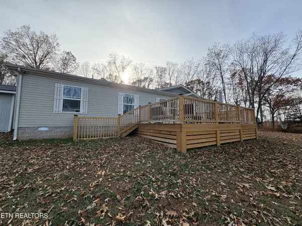 a house view with a backyard space