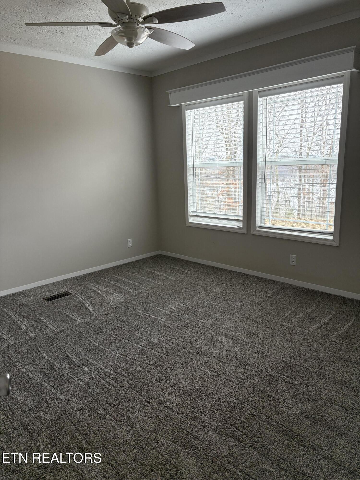 136 Hillview Road Ten Mile, TN 37880 - Photo 18 of 34 a view of an empty room with a window