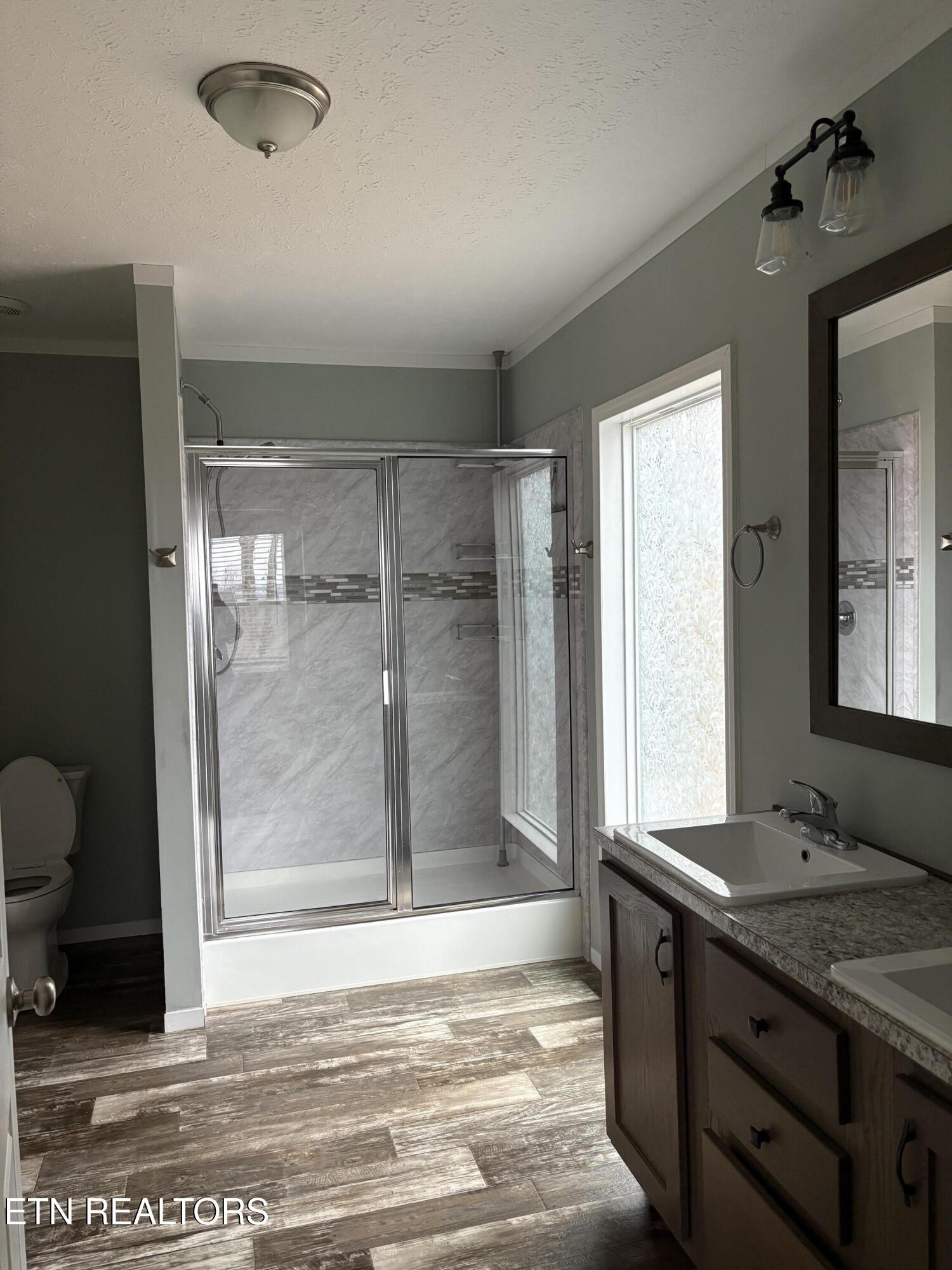 136 Hillview Road Ten Mile, TN 37880 - Photo 19 of 34 a bathroom with a sink and a mirror