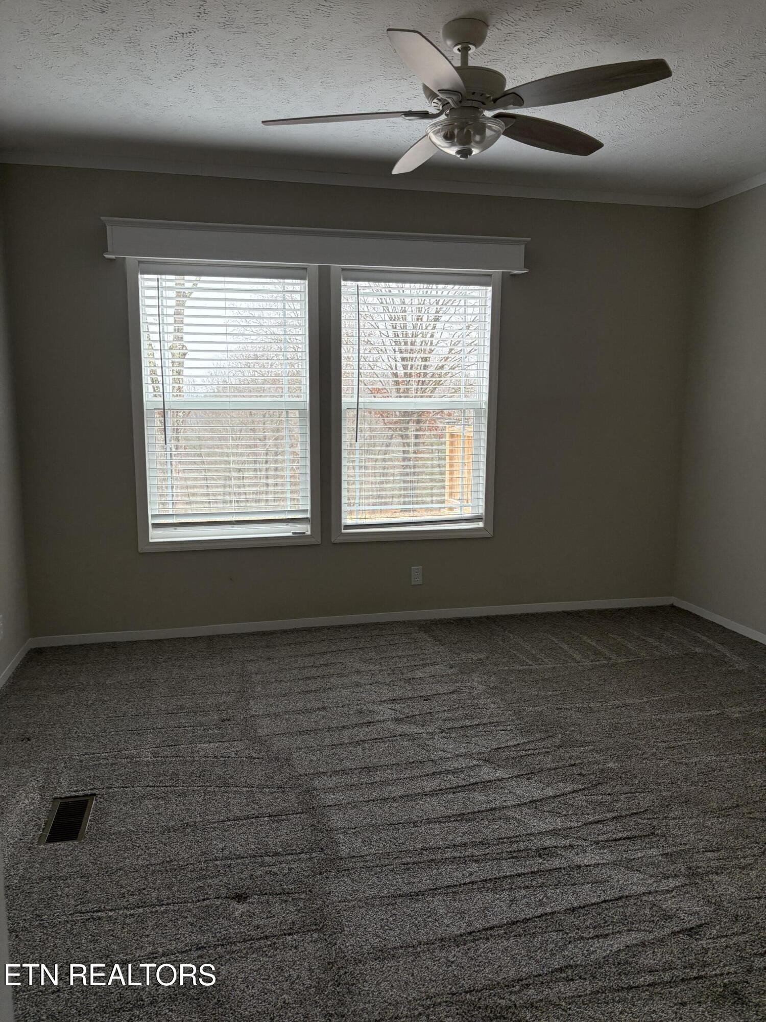 136 Hillview Road Ten Mile, TN 37880 - Photo 21 of 34 a view of an empty room with a window