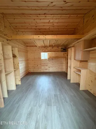 a view of a room with racks on the wall