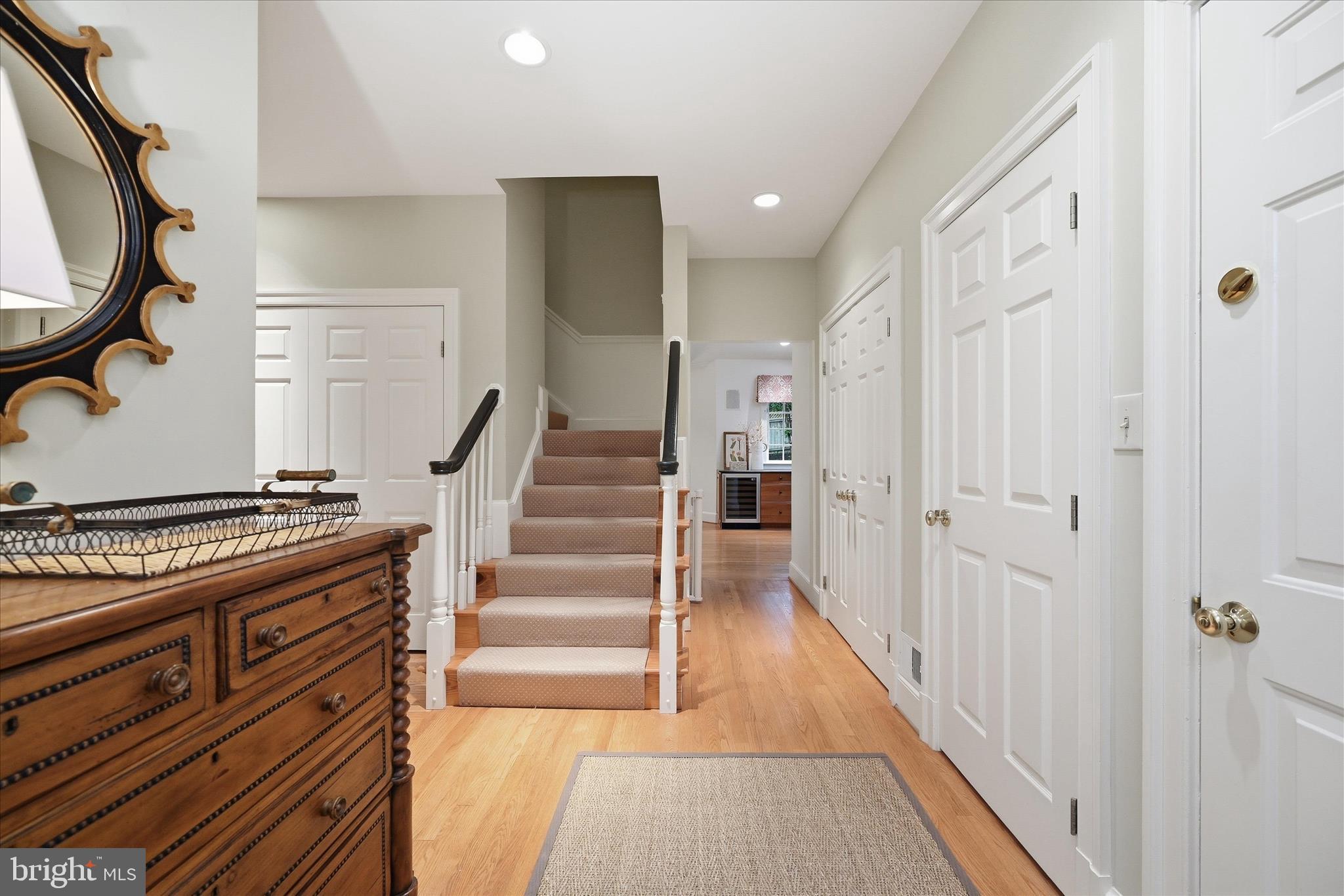 3824 Military Road Arlington, VA 22207 - Photo 19 of 54 a view of a hallway with wooden floor and staircase