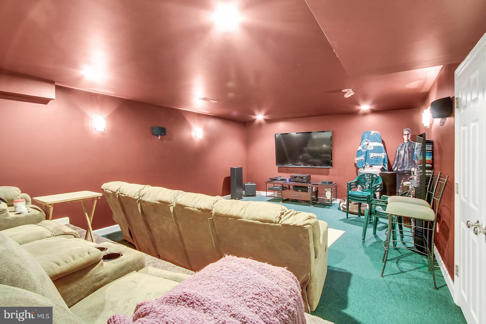109 Atlantic Avenue Sinking Spring, PA 19608 - Photo 20 of 25 a living room with furniture and a flat screen tv