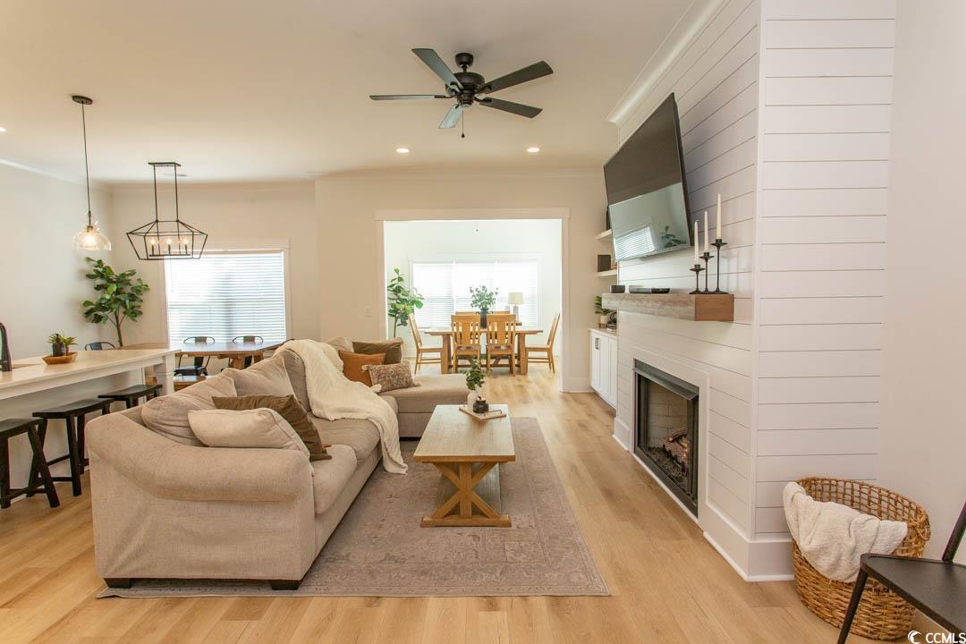 2129 Pleasant Grove Road Loris, SC 29569 - Photo 3 of 33 Living room featuring ceiling fan with notable cha