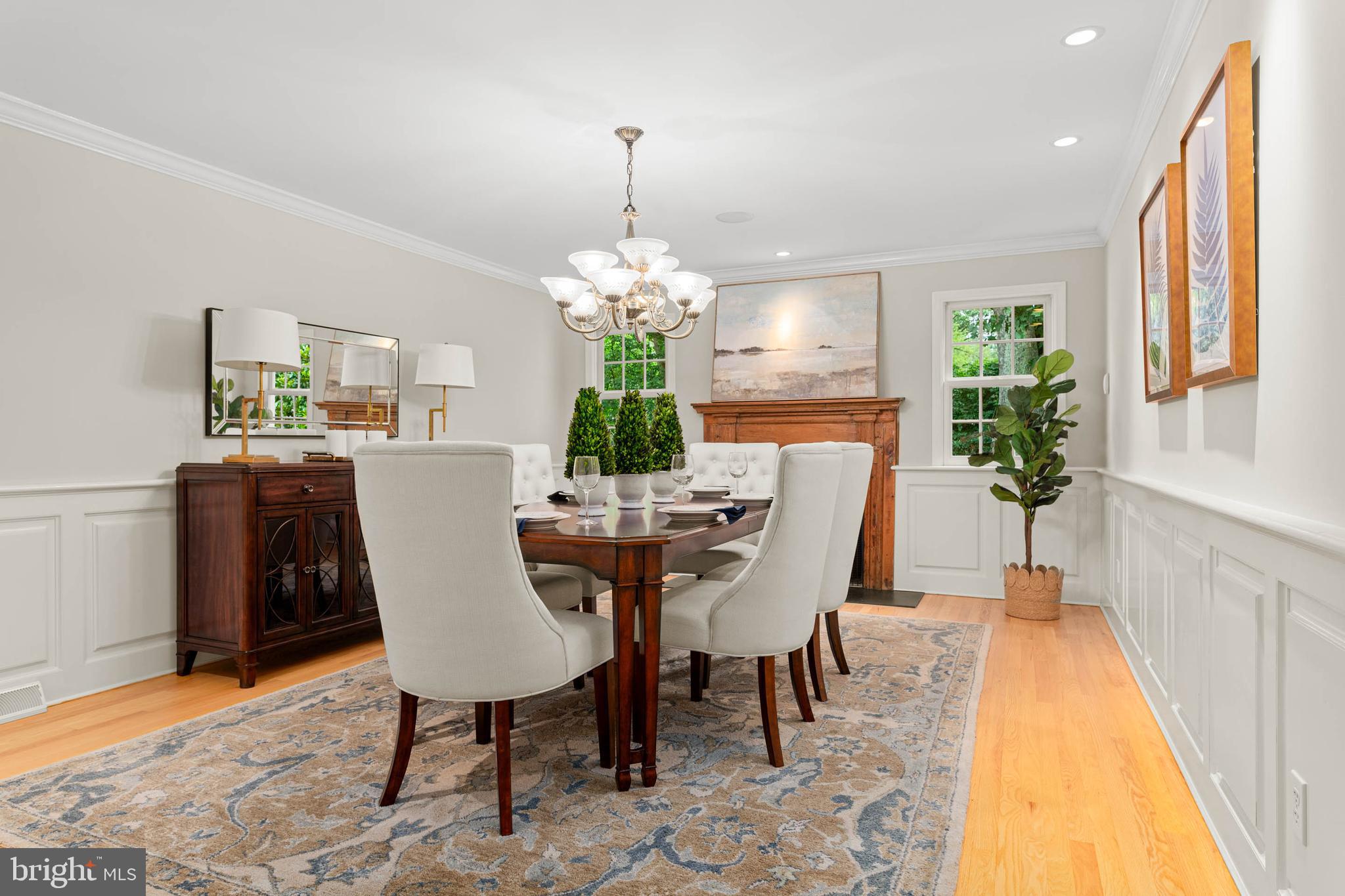 240 Church Road Devon, PA 19333 - Photo 11 of 75 a view of a dining room with furniture and a chandelier
